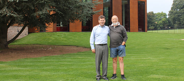Michael Eavis and Eric Parry outside the newly-built Cedars Hall