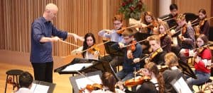 Symphony Orchestra Rehearsing in Eavis Hall, in Cedars Hall
