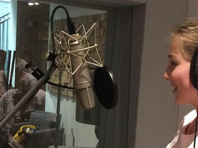 Harriet working on a voice-over