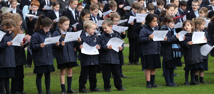 Children singing Christmas carols at Wells Preparatory School in Somerset