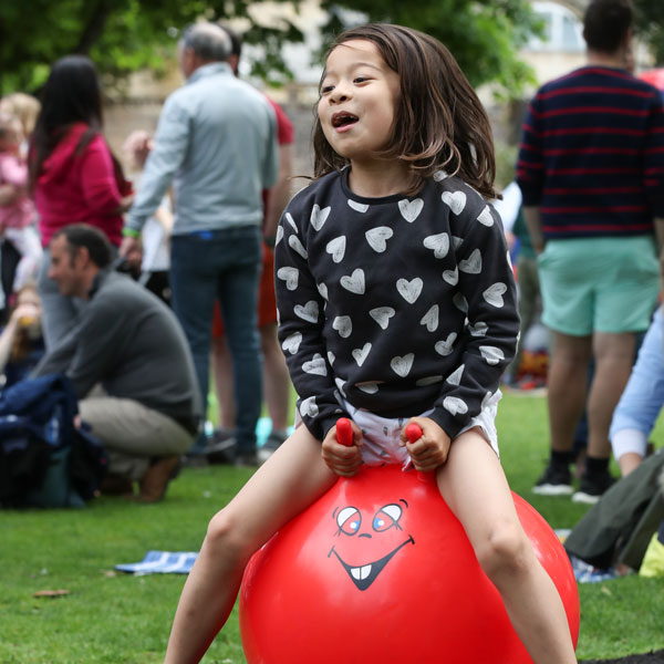 girl on a space hopper at our Independent Prep School Family Fun Day
