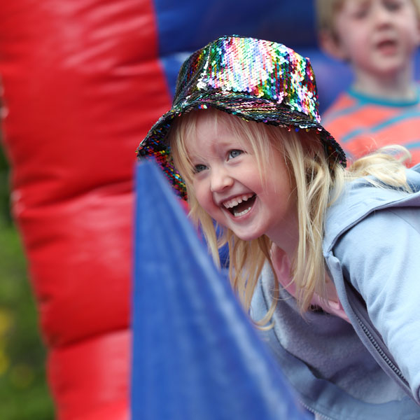 girl in disco hat at our Independent Prep School Family Fun Day