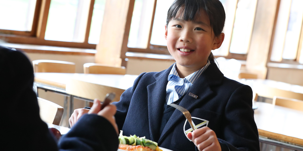 girl in the dining hall at our Prep School in Wells, Somerset