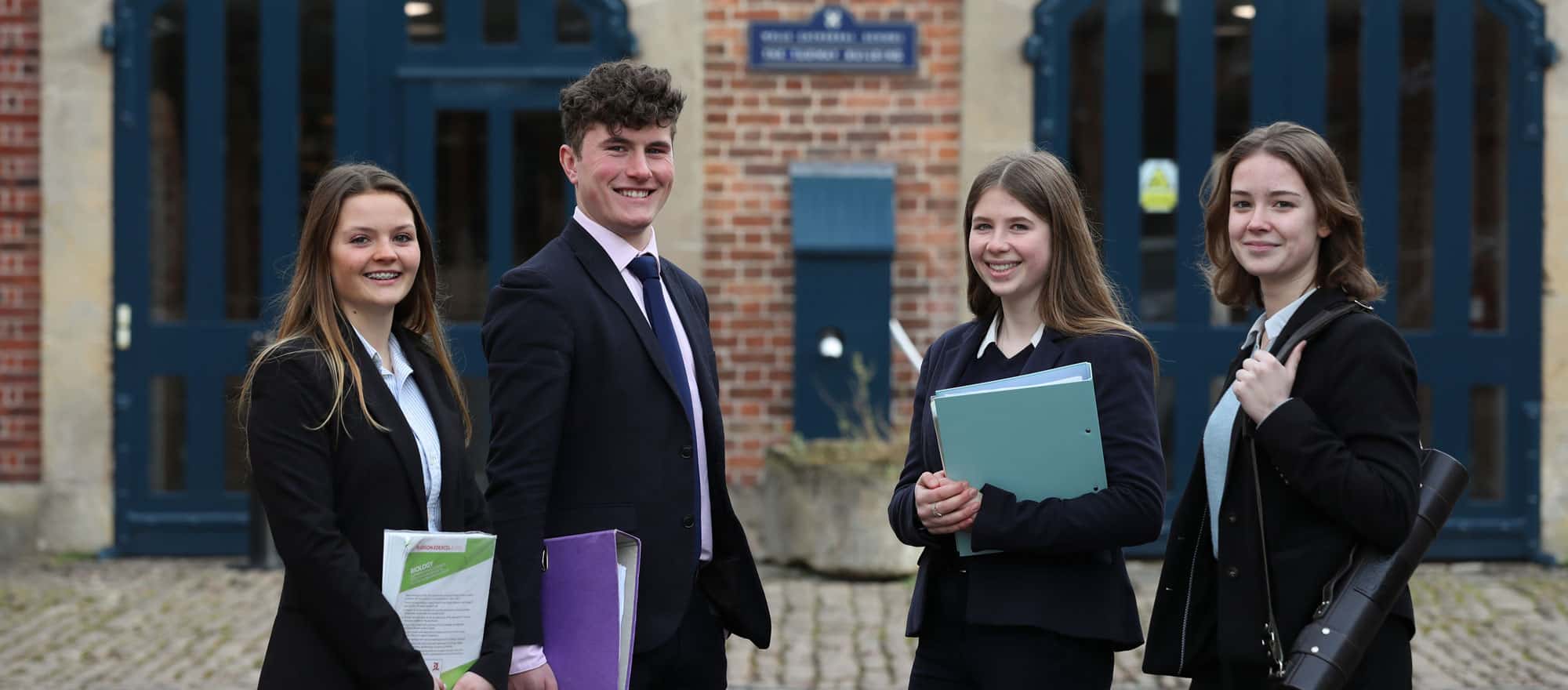 Four Sixth Formers in Stable Yards at Wells Cathedral School in Somerset, UK