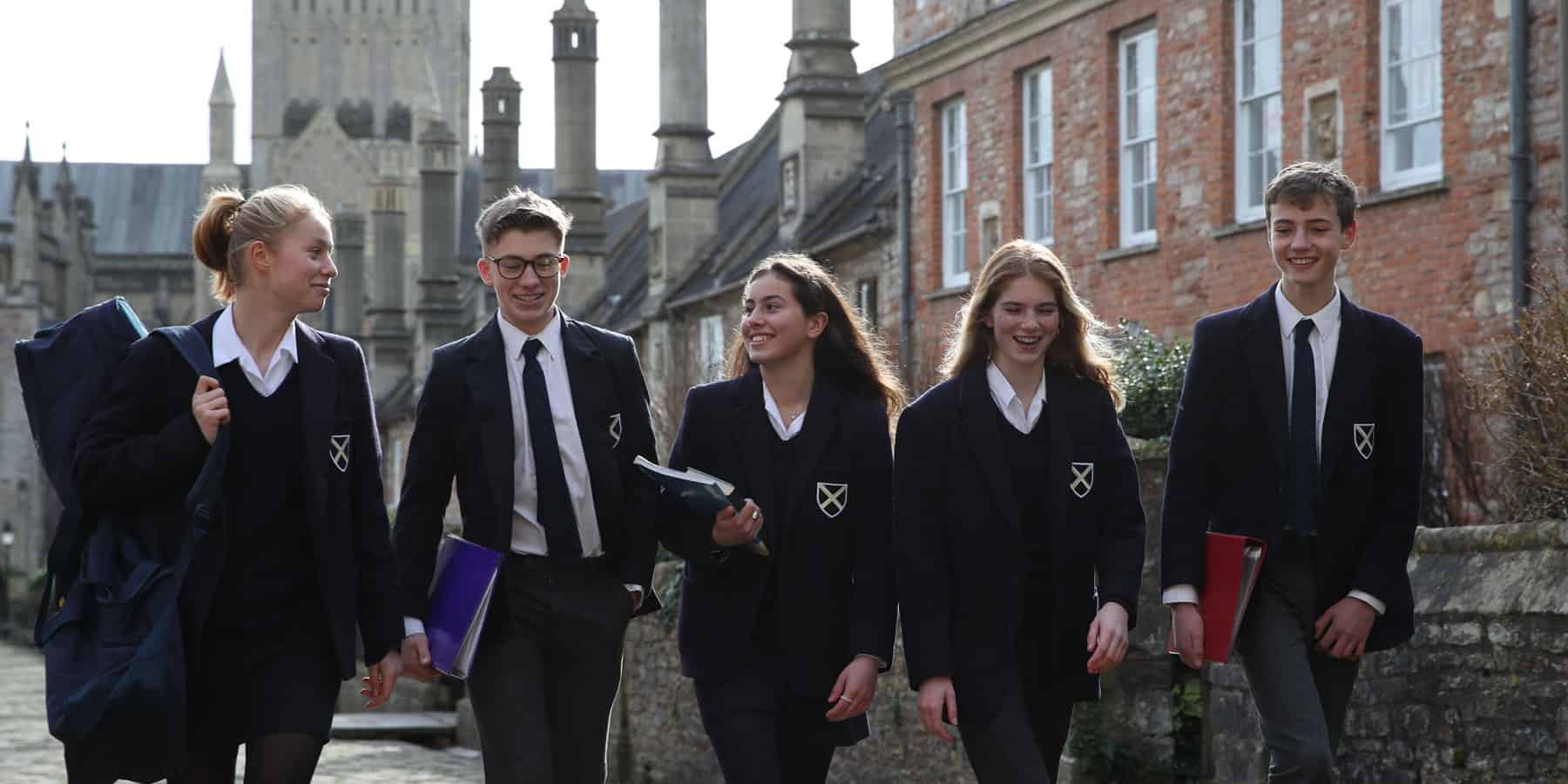 Year 9 pupils walking down Vicars Close