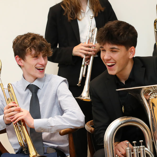 Boys with brass instruments at our Specialist Music School in Wells, Somerset