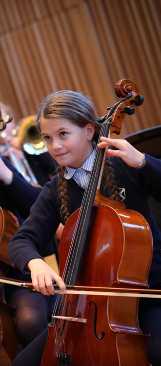Girl playing cello at our Independent Prep School in Wells, Somerset