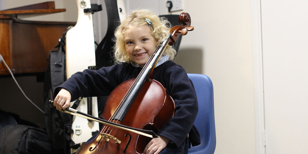 Girl playing cello at our Independent Pre-Prep in Somerset