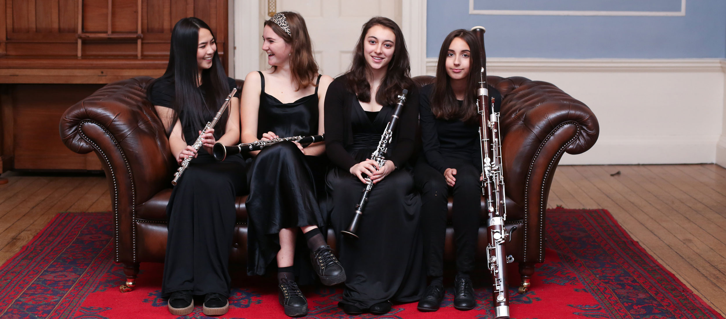 Girls with woodwind instruments at our Specialist Music School in Wells Somerset England