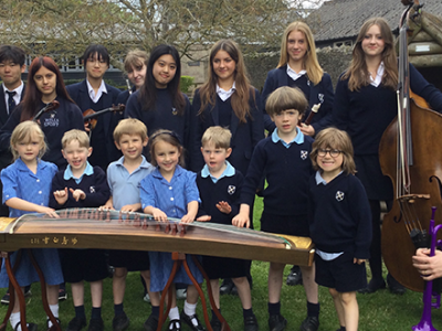 Year 10 musicians visit Reception class WCS Wells Cathedral School an Independent Prep in Somerset England