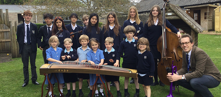 Year 10 musicians visit Reception class WCS Wells Cathedral School an Independent Prep in Somerset England