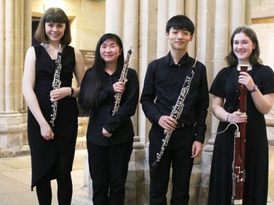 Group of children with oboes and bassoons at our Specialist Music School in Wells Somerset