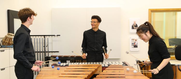 Three specialist musicians playing marimba at our Specialist Music School in England