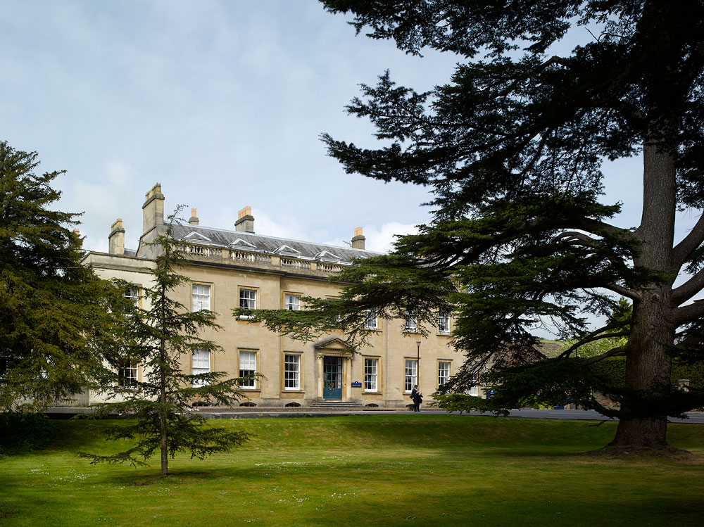 Boys walking down Vicars Close at dusk