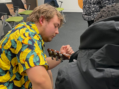Luca leads music workshops for refugees WCS Wells Cathedral School Independent Prep Somerset England
