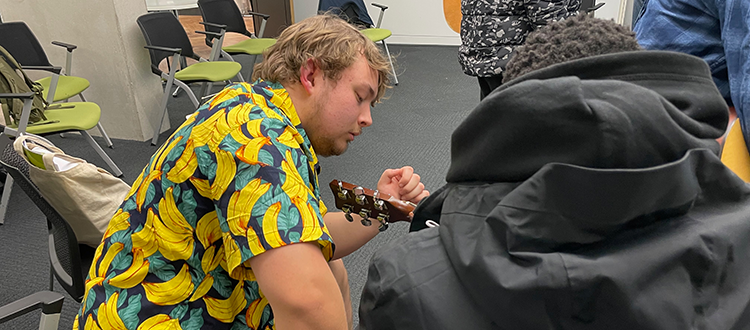 Luca leads music workshops for refugees WCS Wells Cathedral School Independent Prep Somerset England