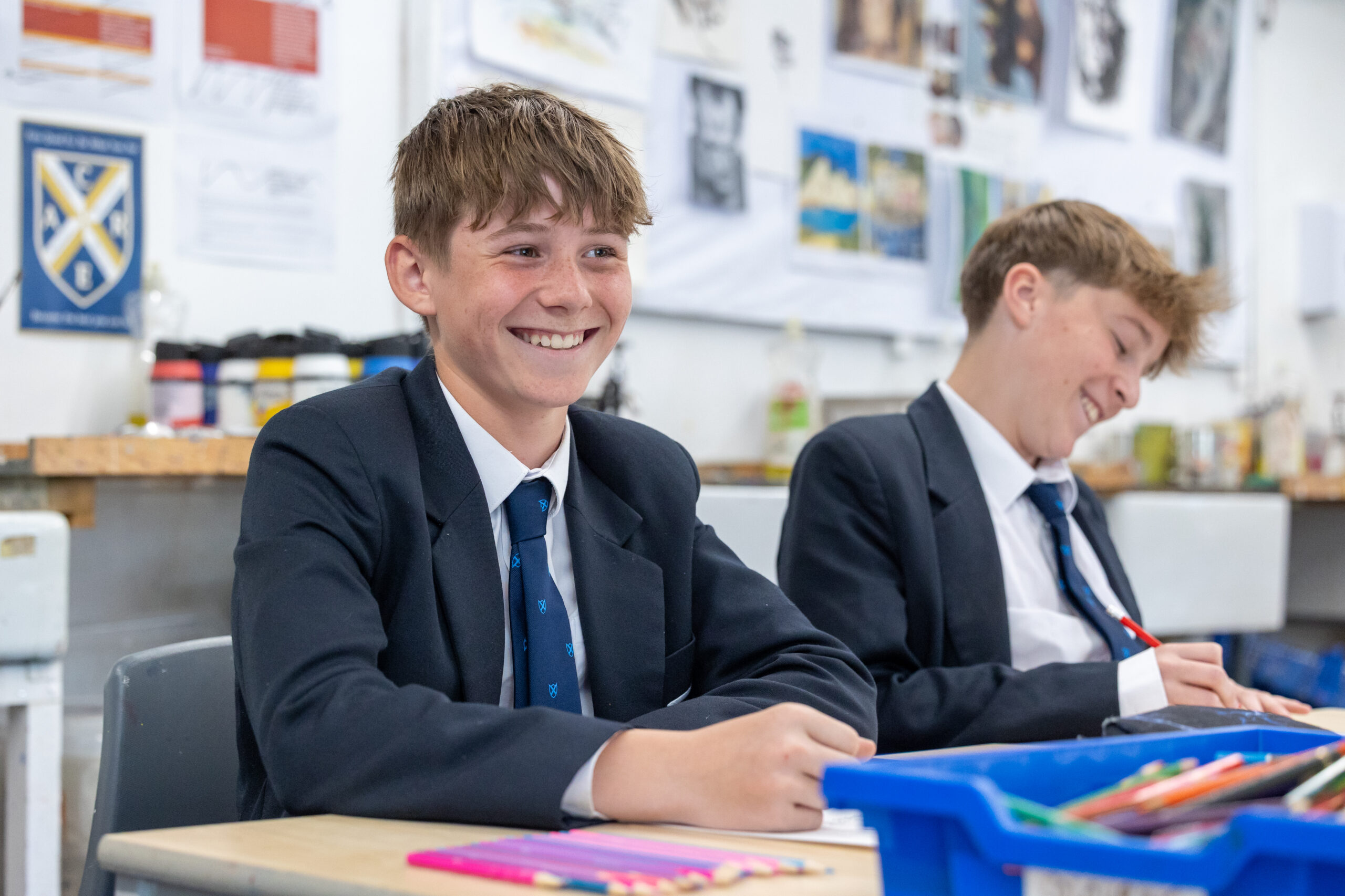 Boys walking down Vicars Close at dusk